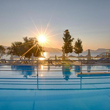 Porto Galini Seaside Resort & Spa Никиана Экстерьер фото Sunset at the pool