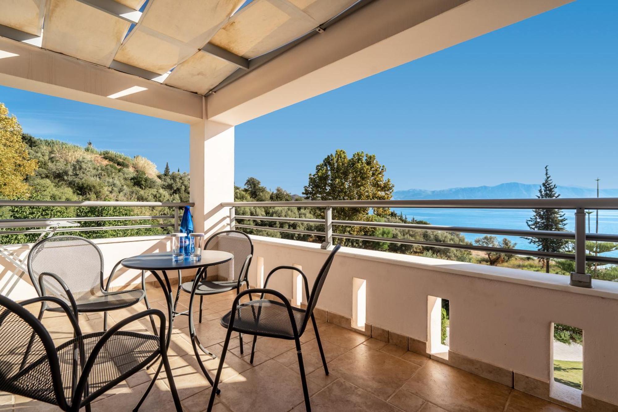 Porto Galini Seaside Resort & Spa Никиана Экстерьер фото A balcony in Greece