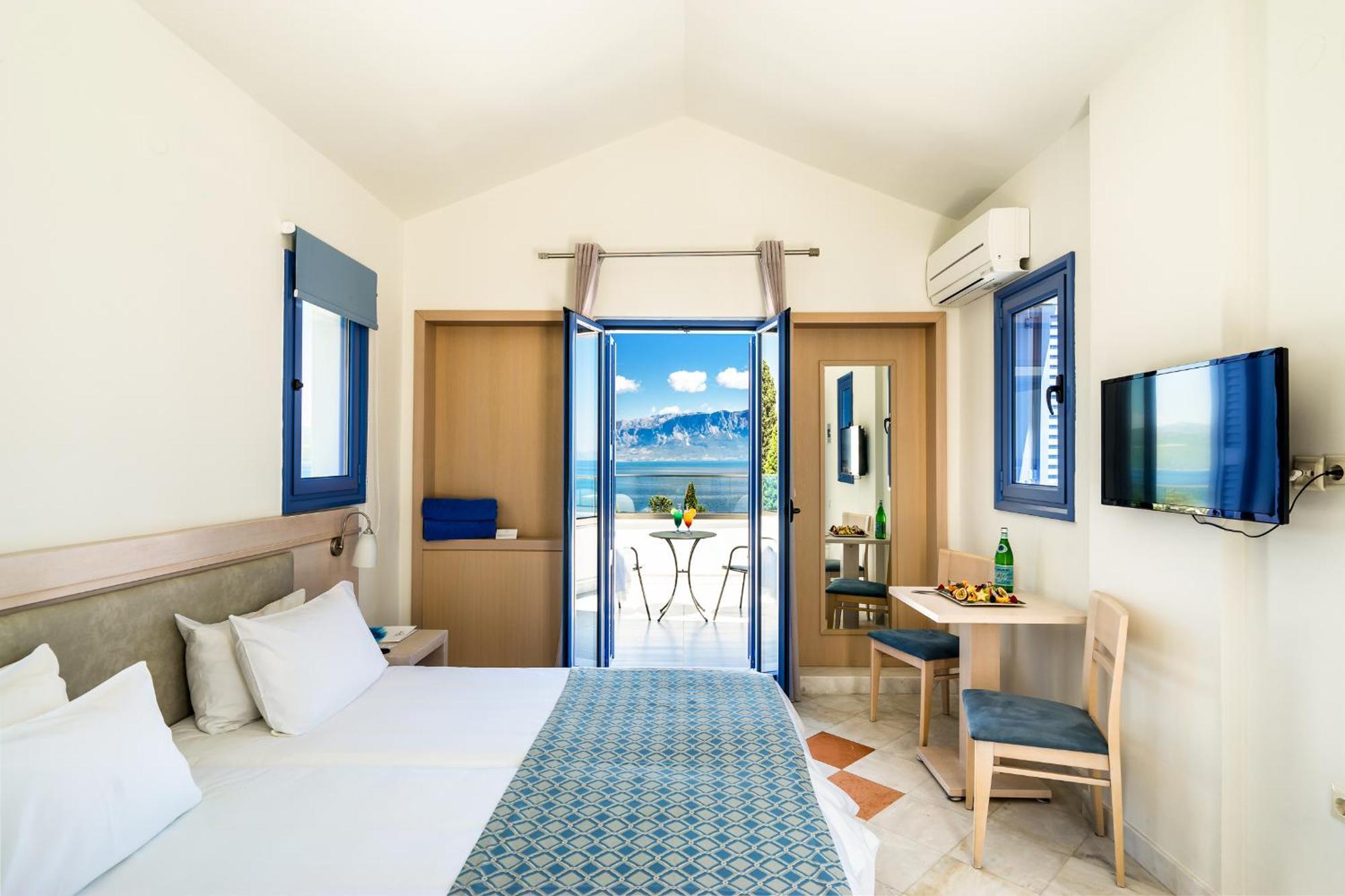 Porto Galini Seaside Resort & Spa Никиана Экстерьер фото A typical room at the hotel