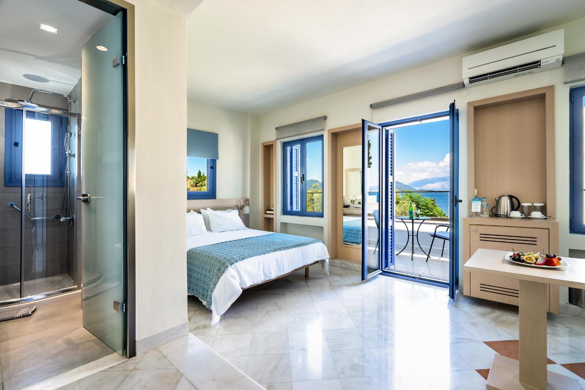 Porto Galini Seaside Resort & Spa Никиана Экстерьер фото A typical room at the hotel