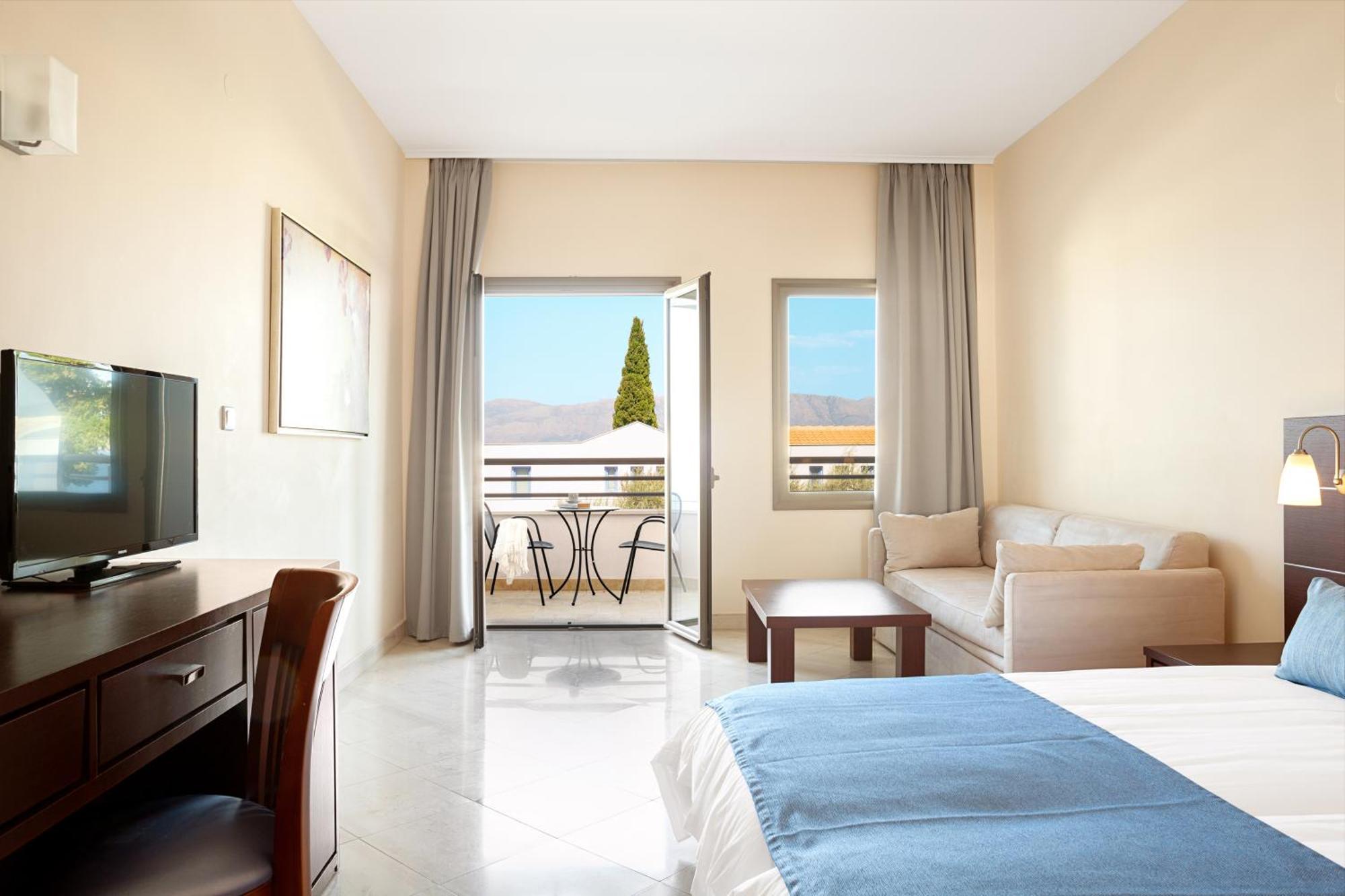 Porto Galini Seaside Resort & Spa Никиана Экстерьер фото A typical room at the hotel