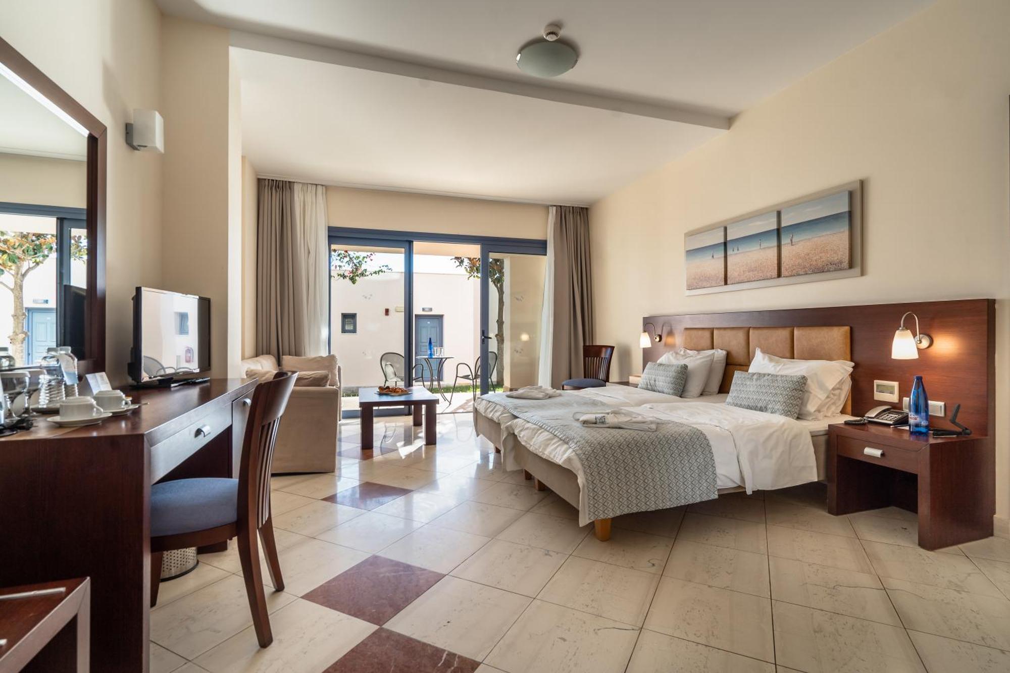 Porto Galini Seaside Resort & Spa Никиана Экстерьер фото A typical room at the hotel
